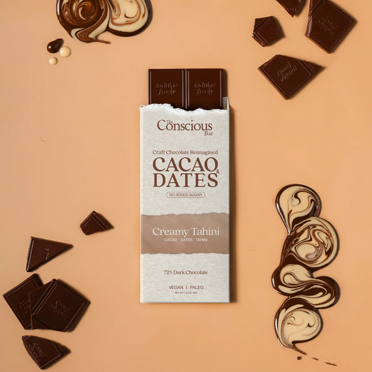 Cacao Dates chocolate bar packaging with chocolate pieces on a beige background